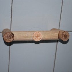 Holder for toilet paper made in solid oak.