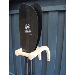 Paddle storage in solid wood with a Werner carbon paddle.